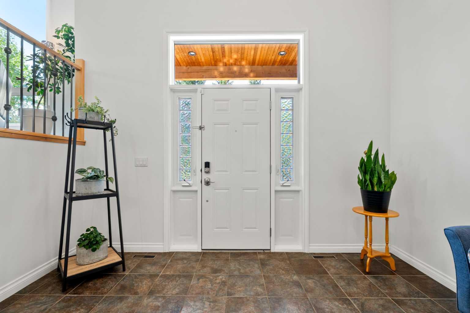 Property Photo: 502 Bearspaw Village Ridge AB T3L 3P1