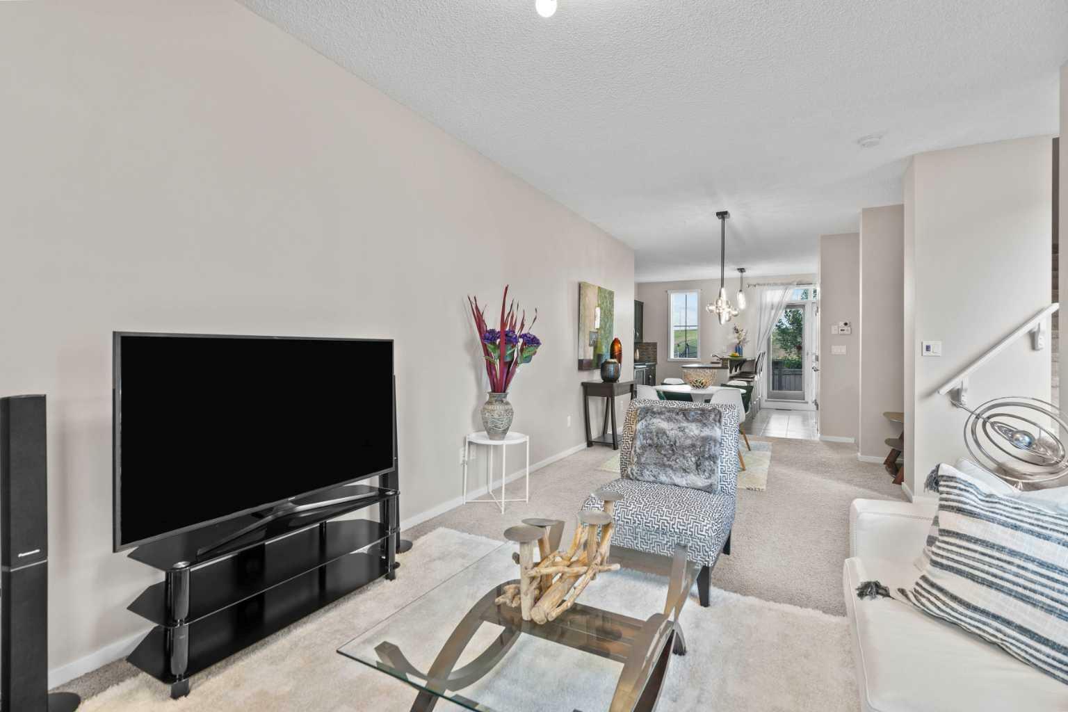 Property Photo: 125 Panatella Way NW 2302 AB T3K 0R9