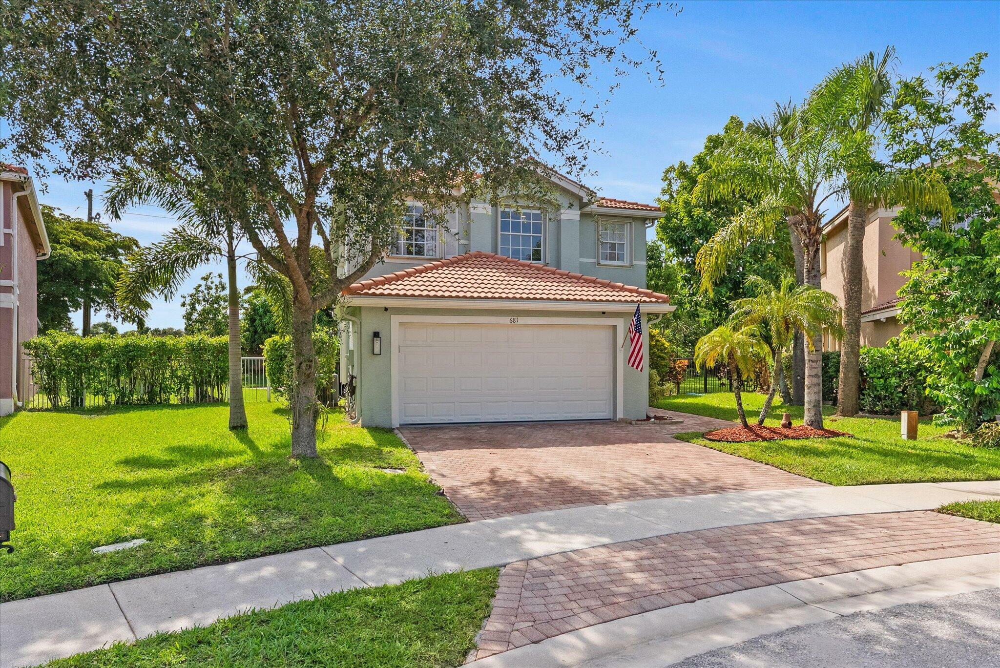 Property Photo: 681 Garden Cress Trail FL 33411