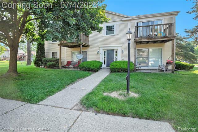 Property Photo: 841 Bloomfield Village Boulevard Unit #D MI 48326