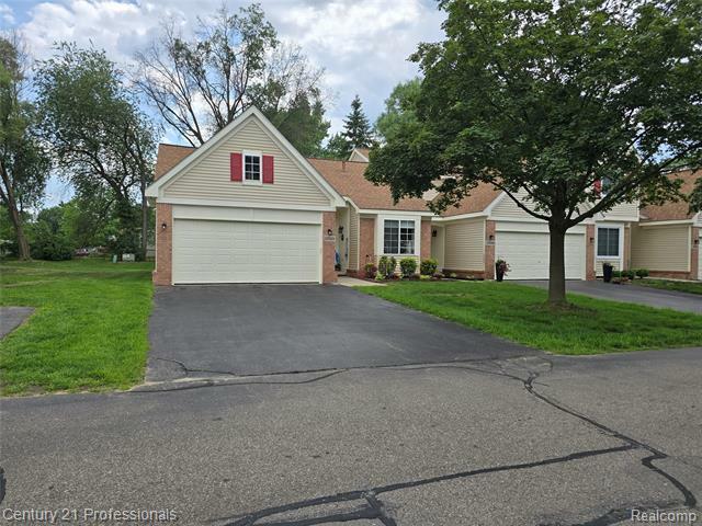 Property Photo: 37329 Amhurst Drive 23 MI 48185