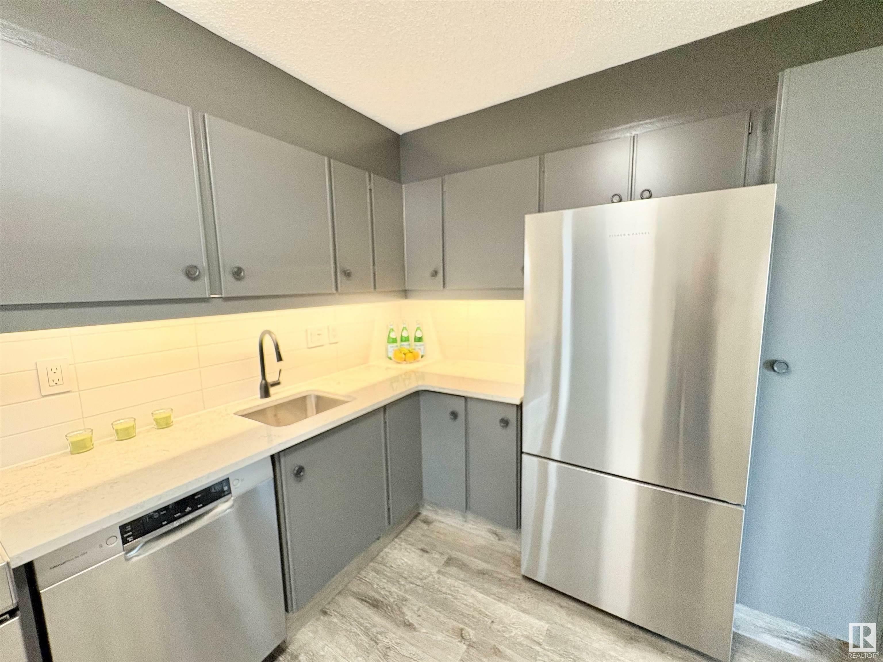 Property Photo: 8340 Jasper Avenue NW 1005 AB T5H 4C6