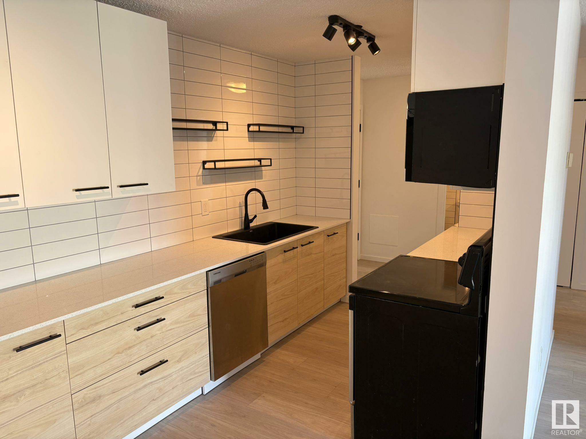 Property Photo: 10615 110 Street NW 302 AB T5H 3C7