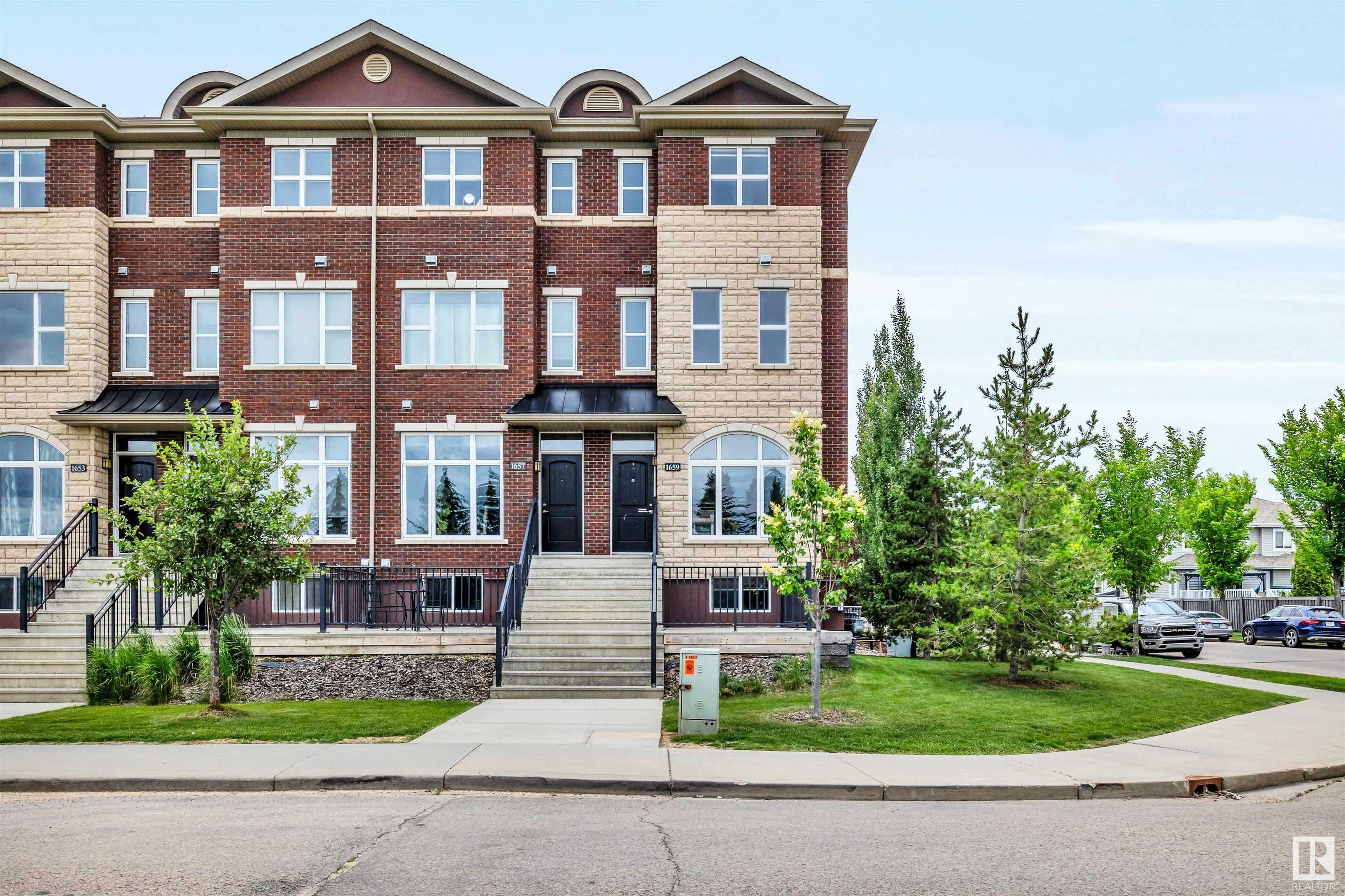 Property Photo: 1659 Cunningham Way SW AB T6W 0V8