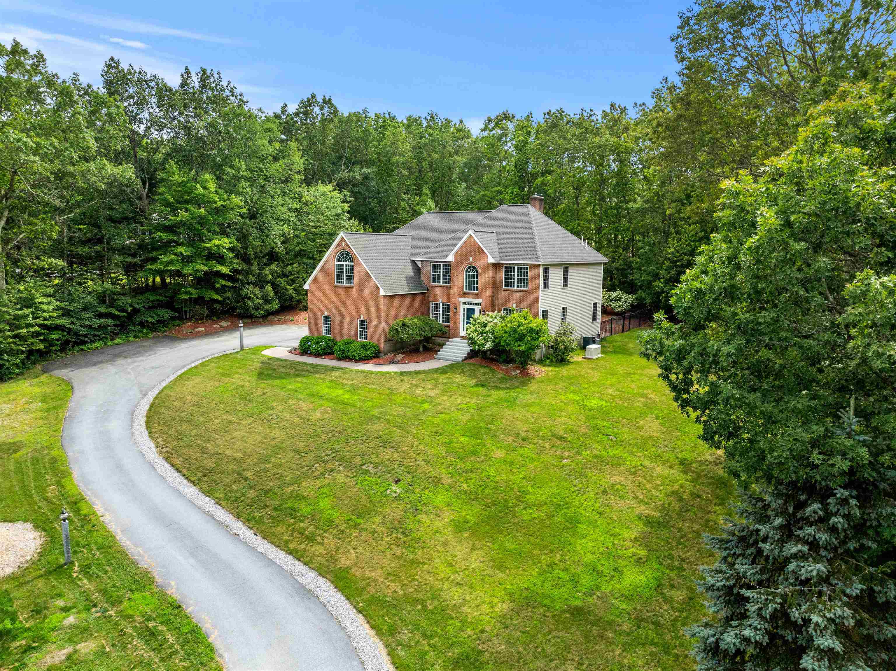 Property Photo: 60 Camelot Drive NH 03110