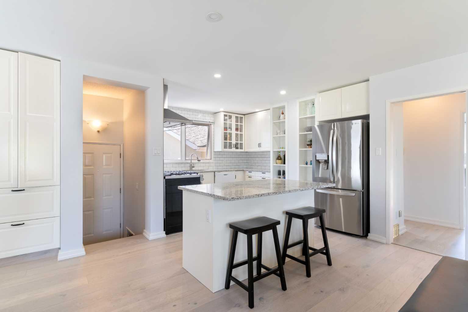 Property Photo:  56 Maple Court Crescent SE  AB T2J 1W1 
