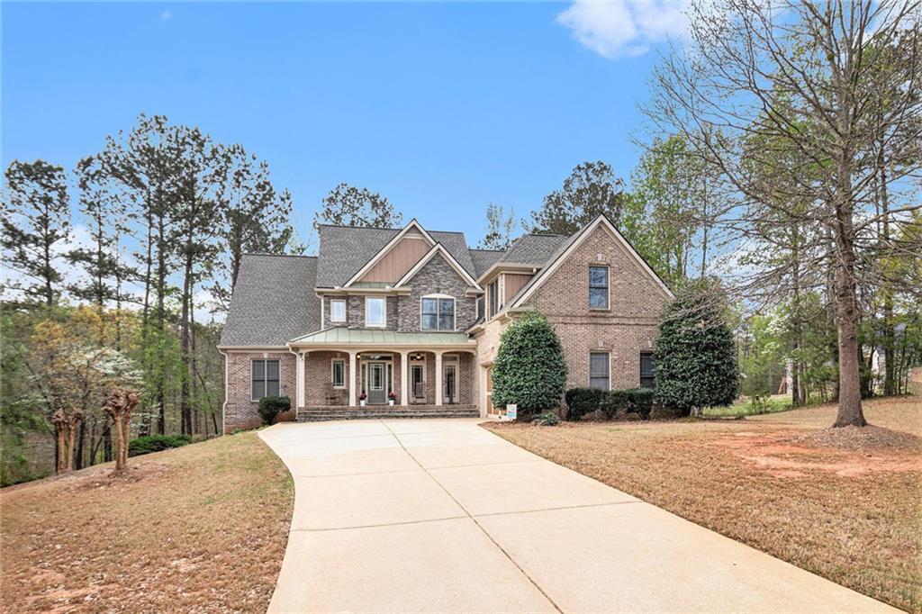 Property Photo:  7497 Treehouse Court  GA 30135 