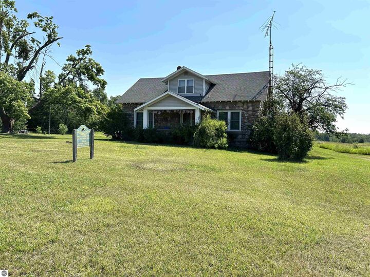 Property Photo:  6851 M-32  MI 49709 