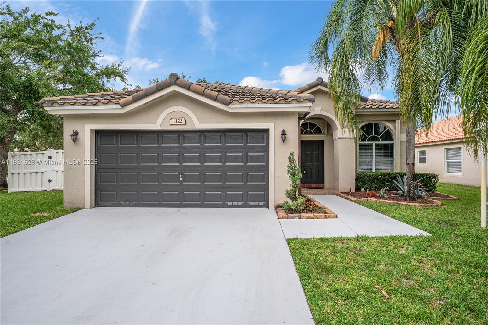 Property Photo: 1122 NW 143rd Ave FL 33028