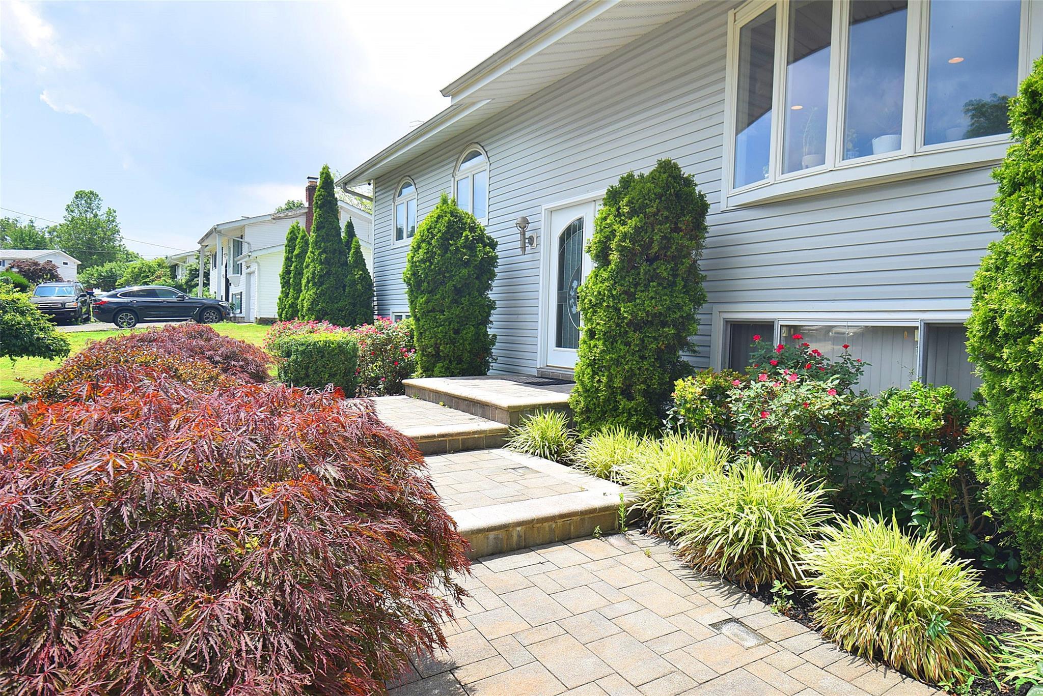 Property Photo: 8 Brookwood Drive NY 11798