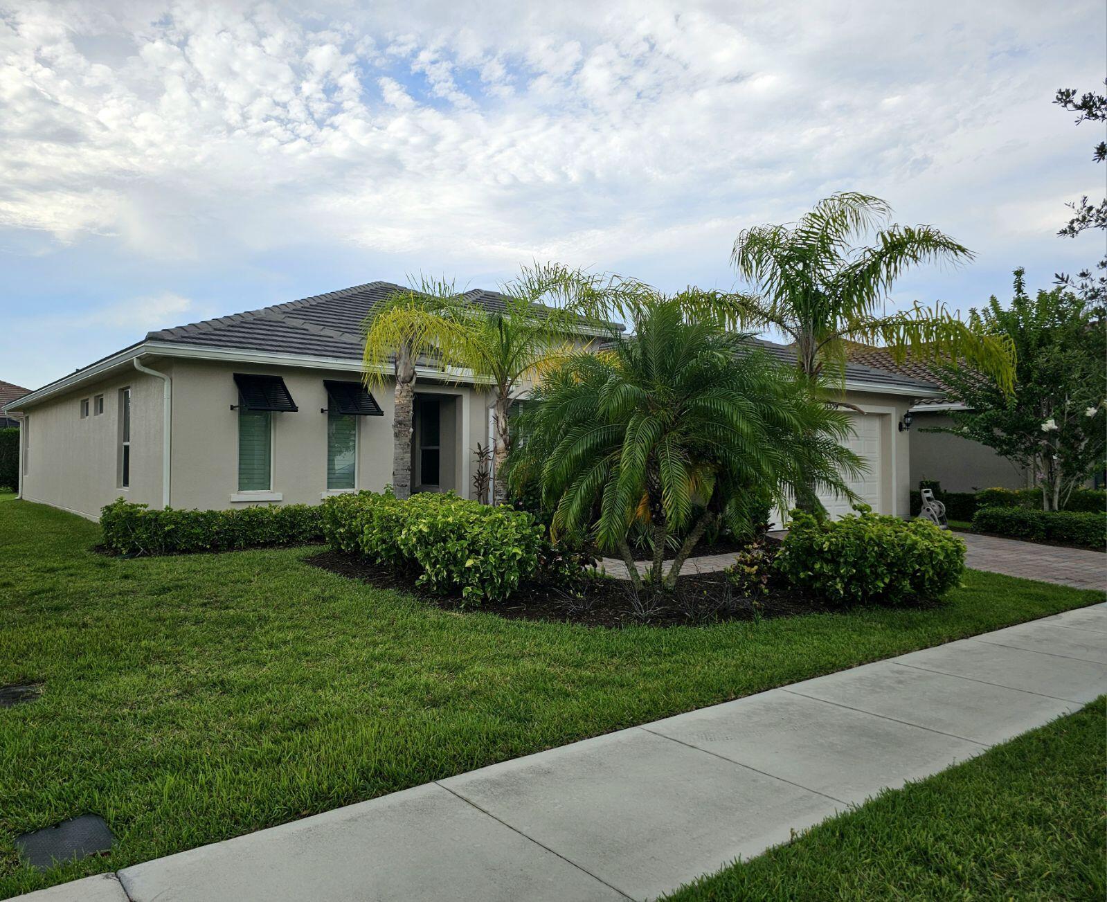 Property Photo: 11359 SW Apple Blossom Trail FL 34987