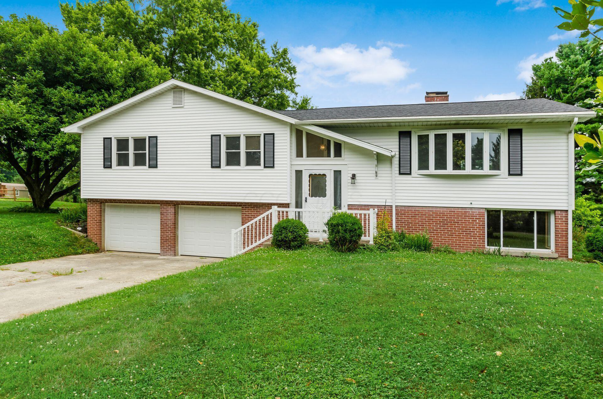 Property Photo:  5930 Coonpath NW Road  OH 43112 