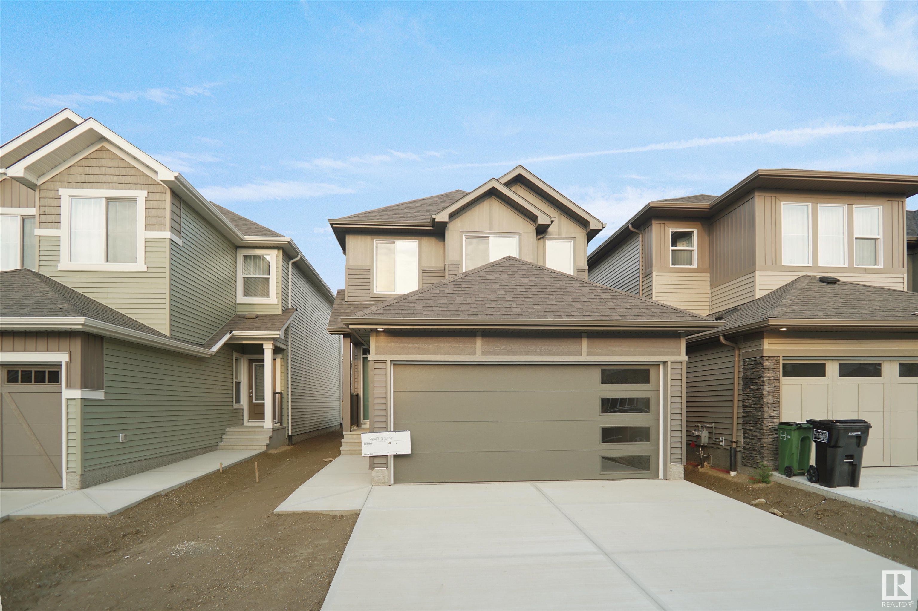 Property Photo: 113 Elliot Wynd AB T8L 0Z4