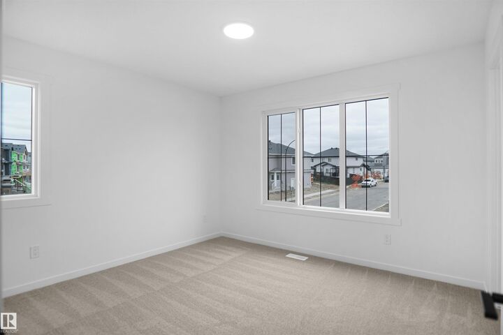 Property Photo: 140 Ficus Way AB T8L 0Z6