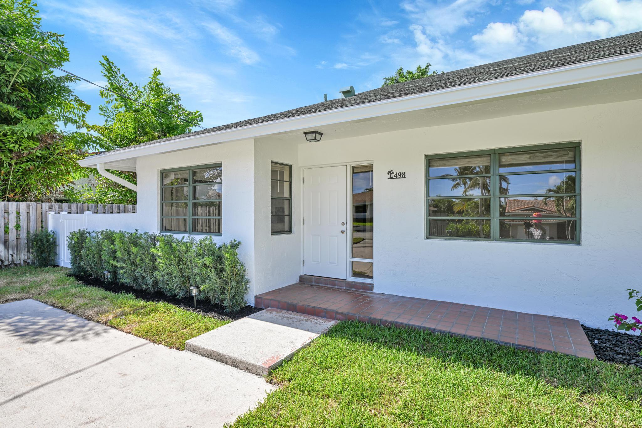 Property Photo: 498 NE 42nd Street FL 33431