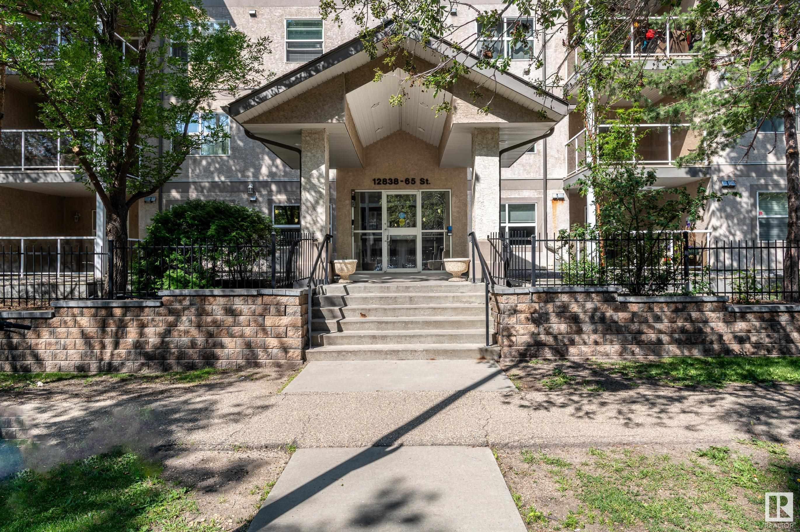 Property Photo: 12838 65 Street NW 301 AB T5A 5H3