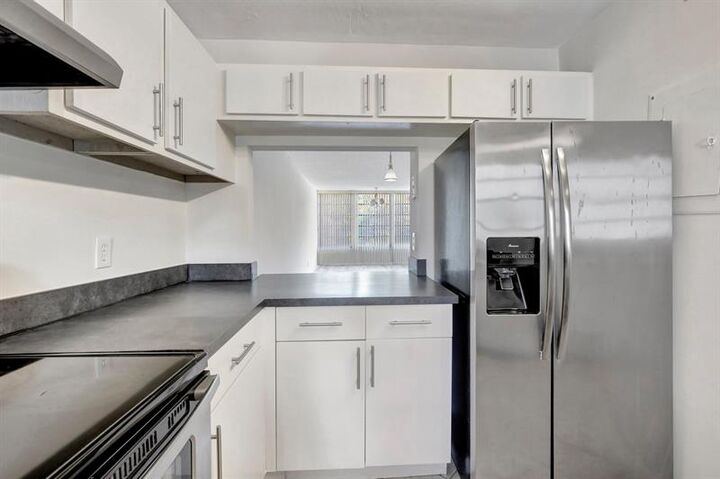 Property Photo:  9450 Live Oak Pl 303  FL 33324 