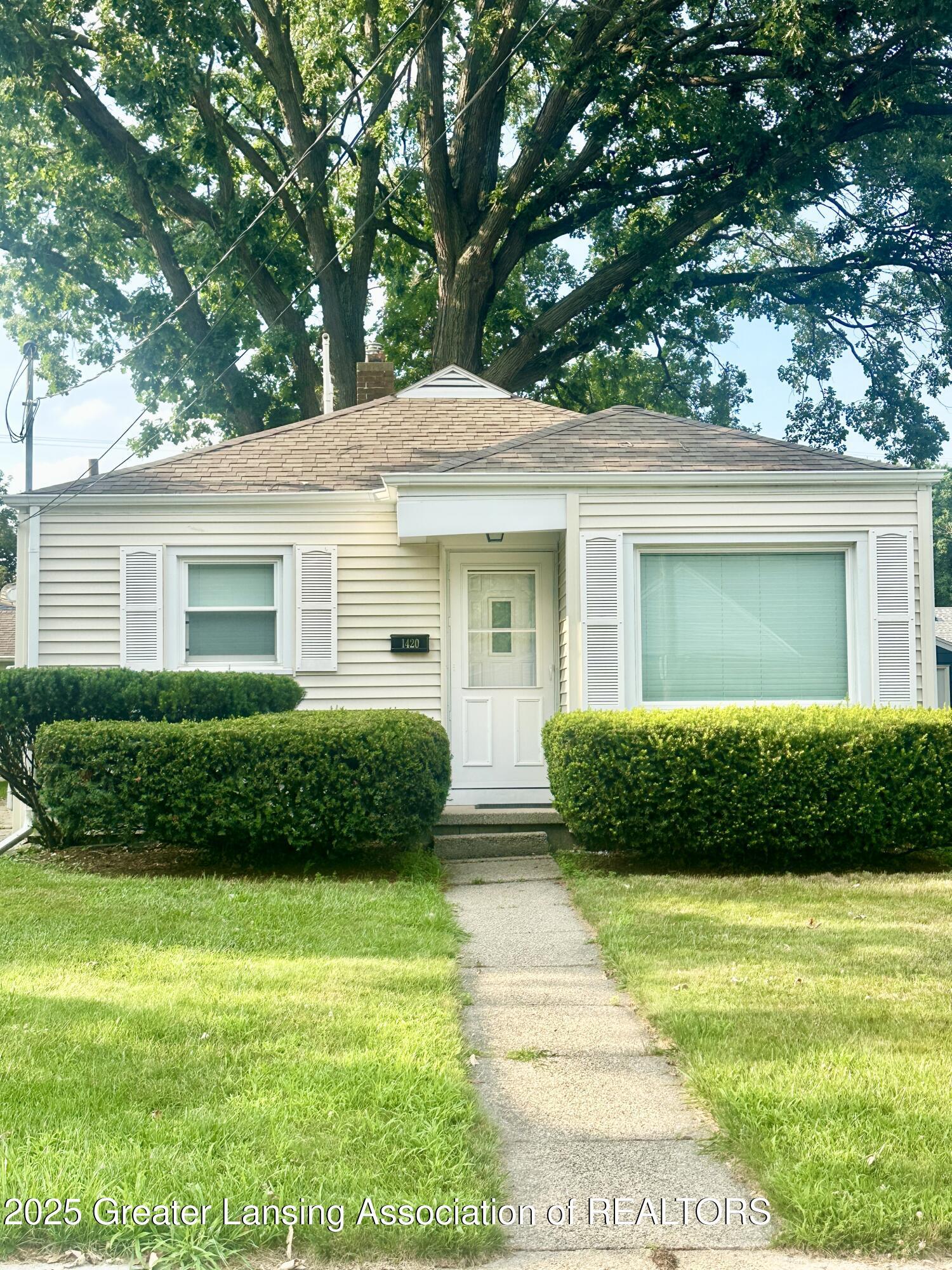 Property Photo: 1420 Cooper Avenue MI 48910