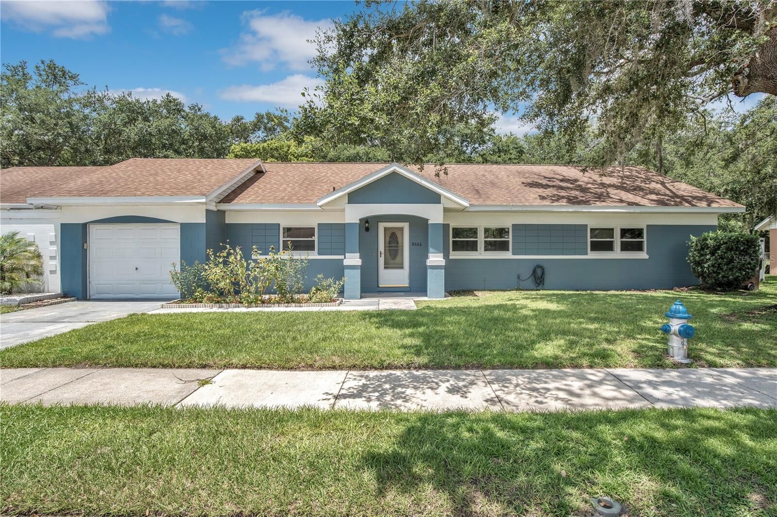 Property Photo: 8666 Wichita Place FL 32827