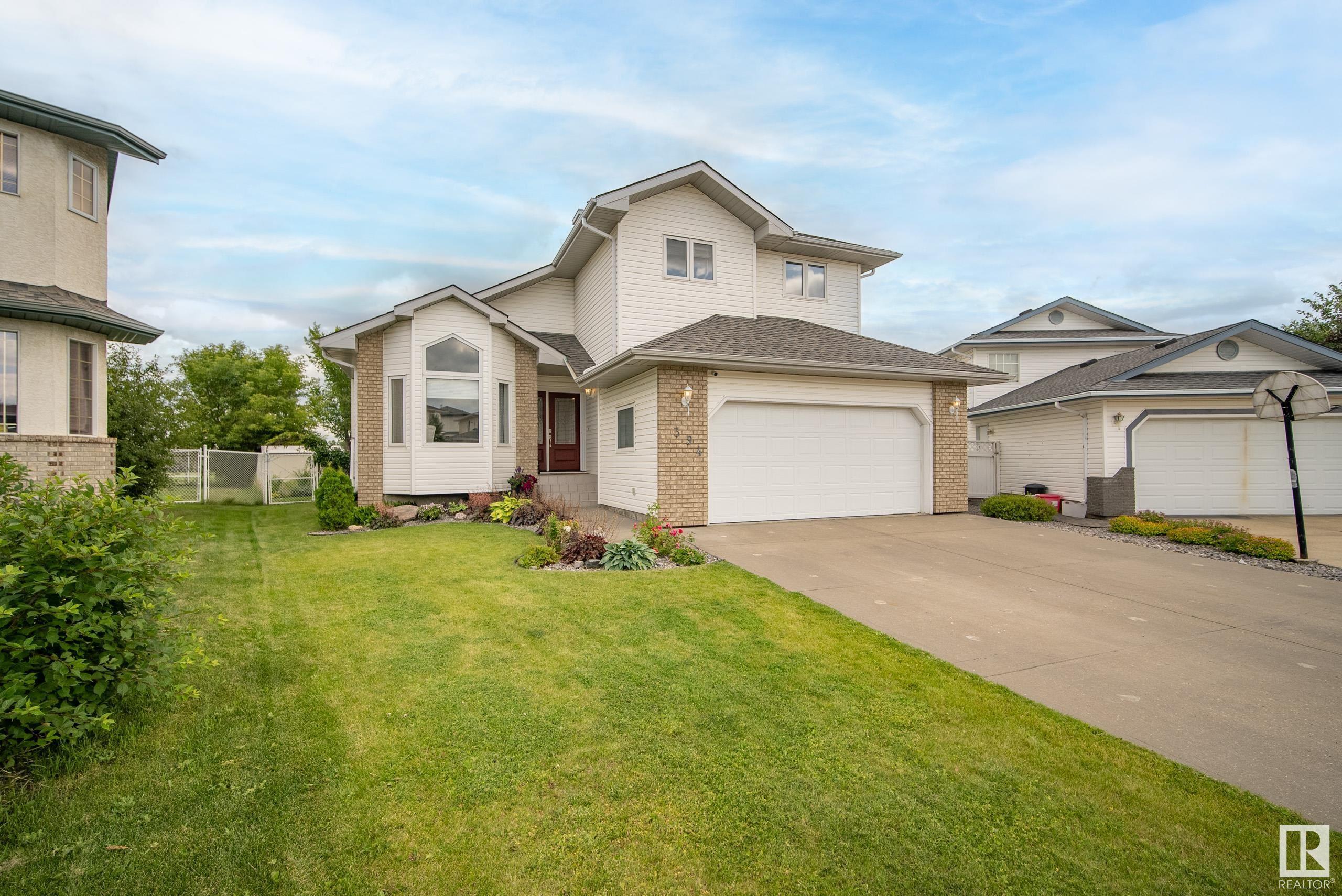 Property Photo:  394 Hollick-Kenyon Road NW  AB T5Y 2T7 