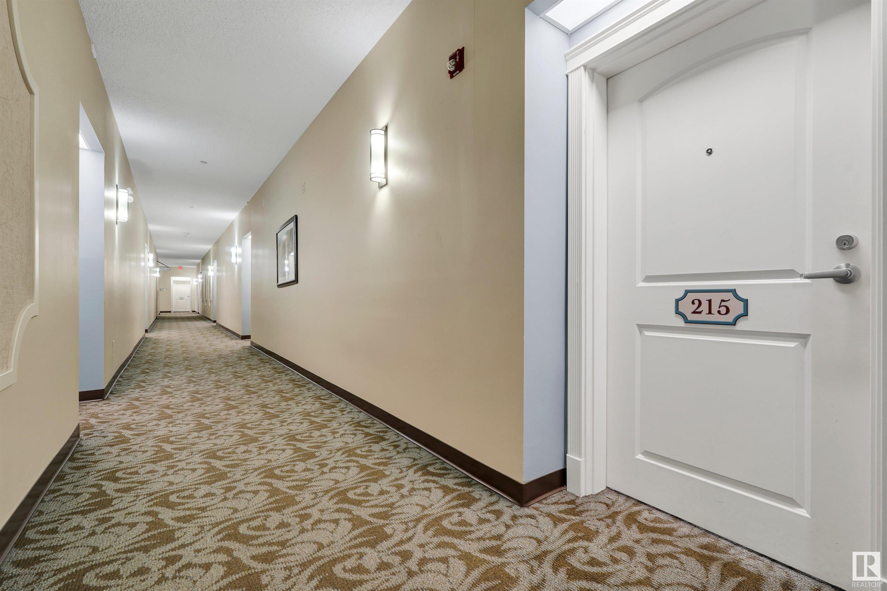 Property Photo:  9820 165 Street NW 215  AB T5P 0N3 
