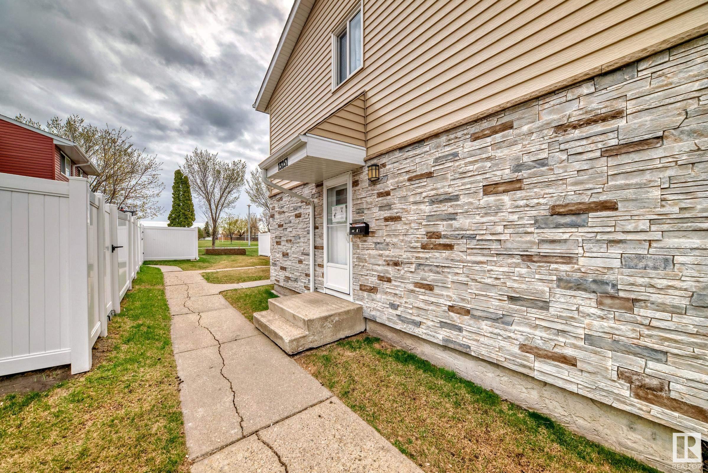 Property Photo: 13251 47 Street NW AB T5A 3L5