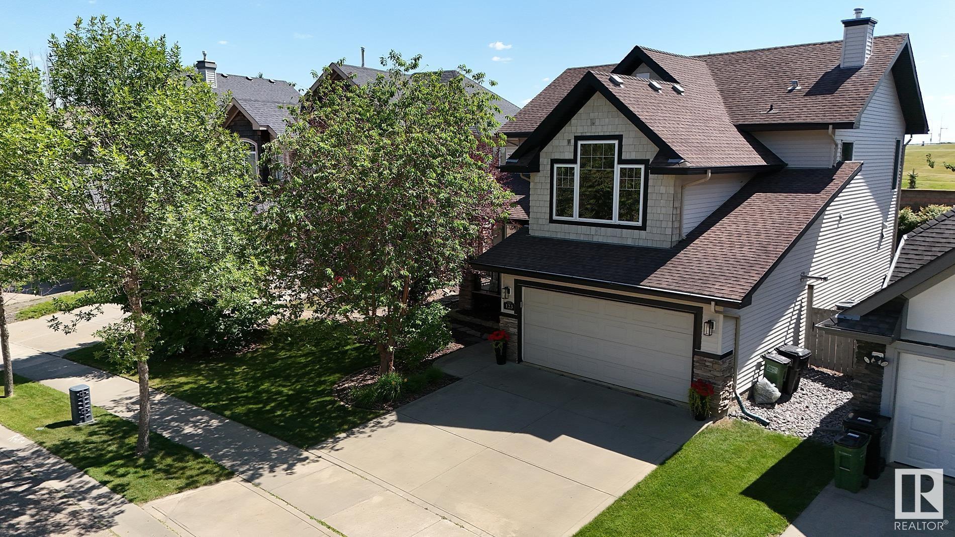 Property Photo:  123 Caldwell Way NW  AB T6M 2X1 