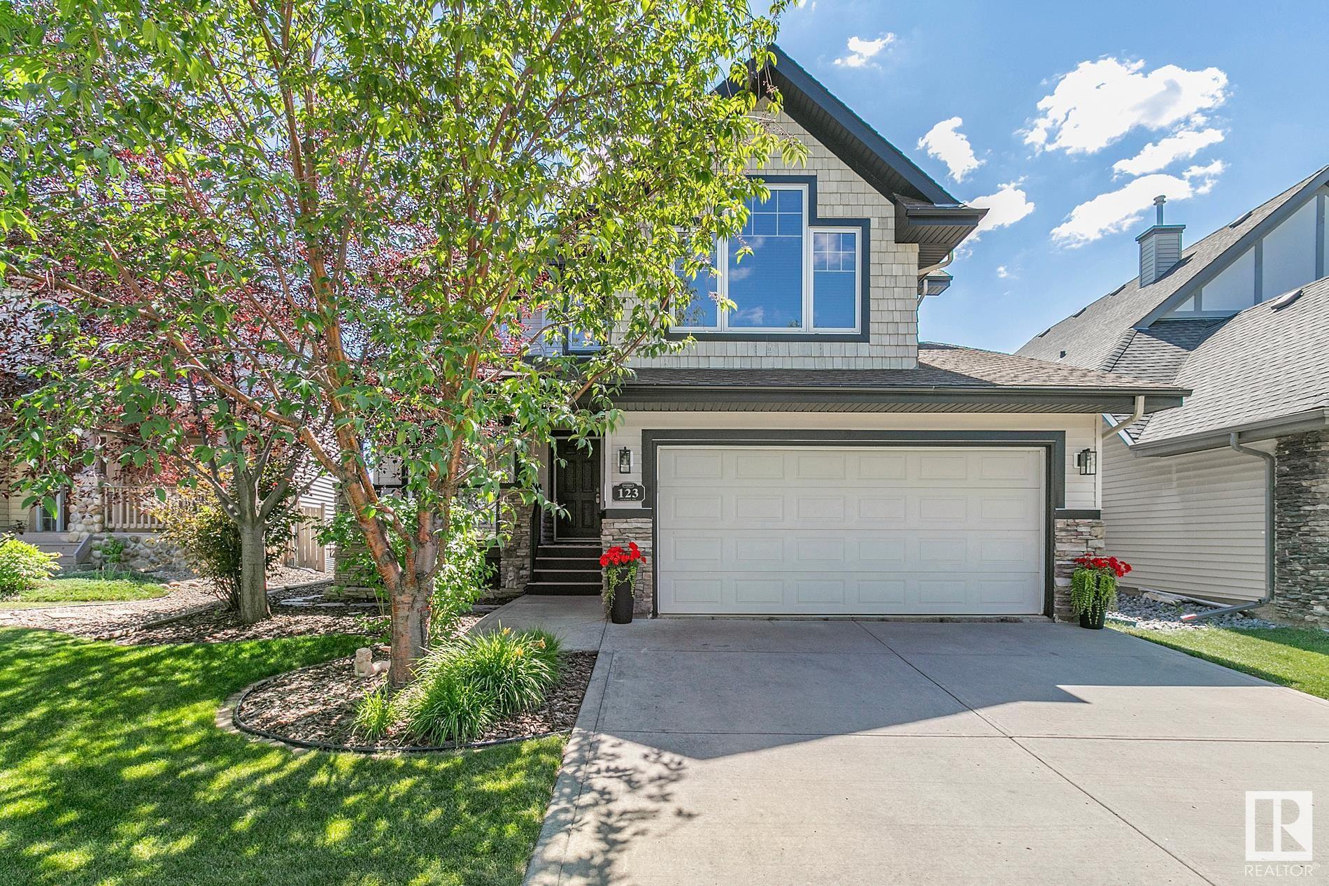 Property Photo:  123 Caldwell Way NW  AB T6M 2X1 