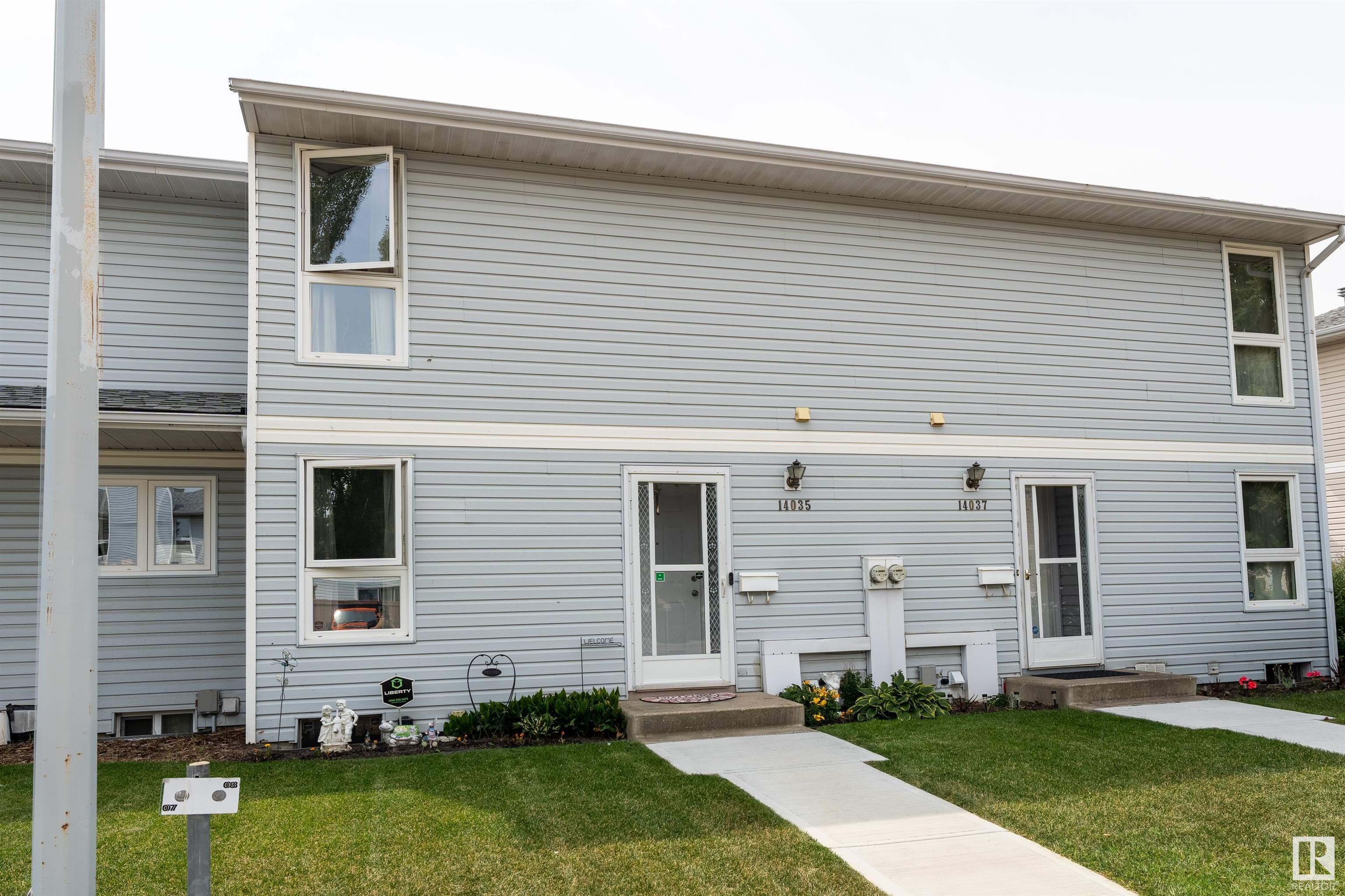 Property Photo:  14035 121 Street NW  AB T5X 4H8 