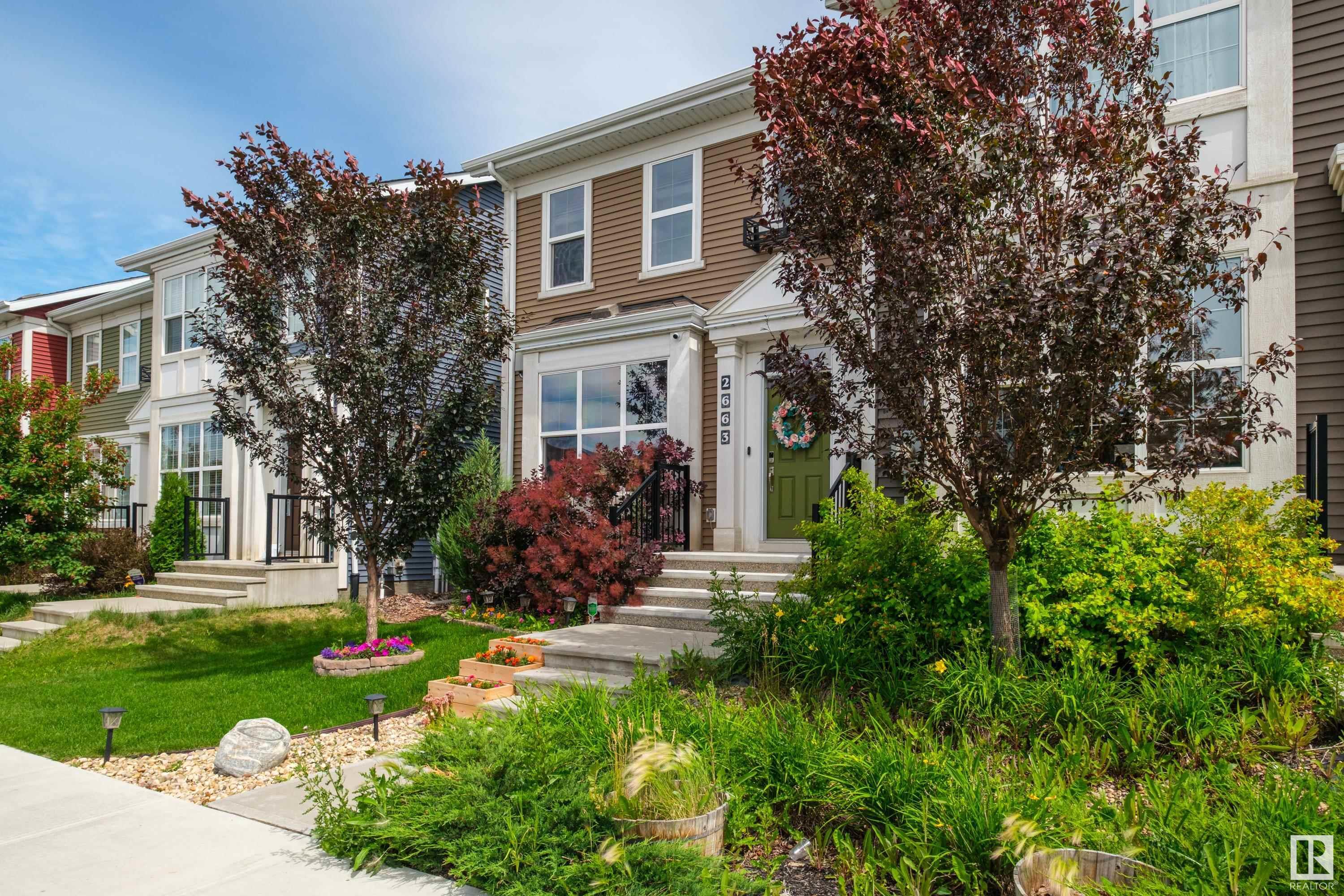 Property Photo: 2663 Maple Way NW AB T6T 2E9