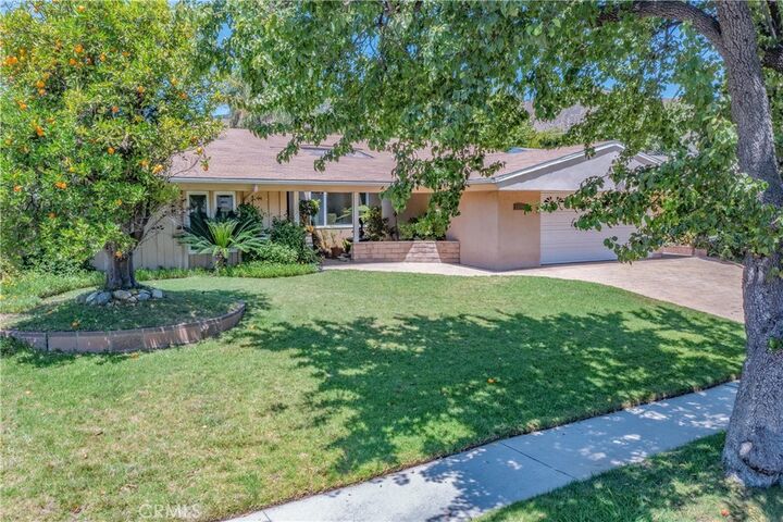 Property Photo: 13011 Barto Dr CA 91344