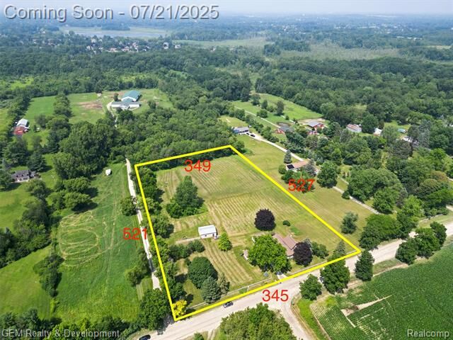 Property Photo:  64164 W 8 Mile Road  MI 48178 