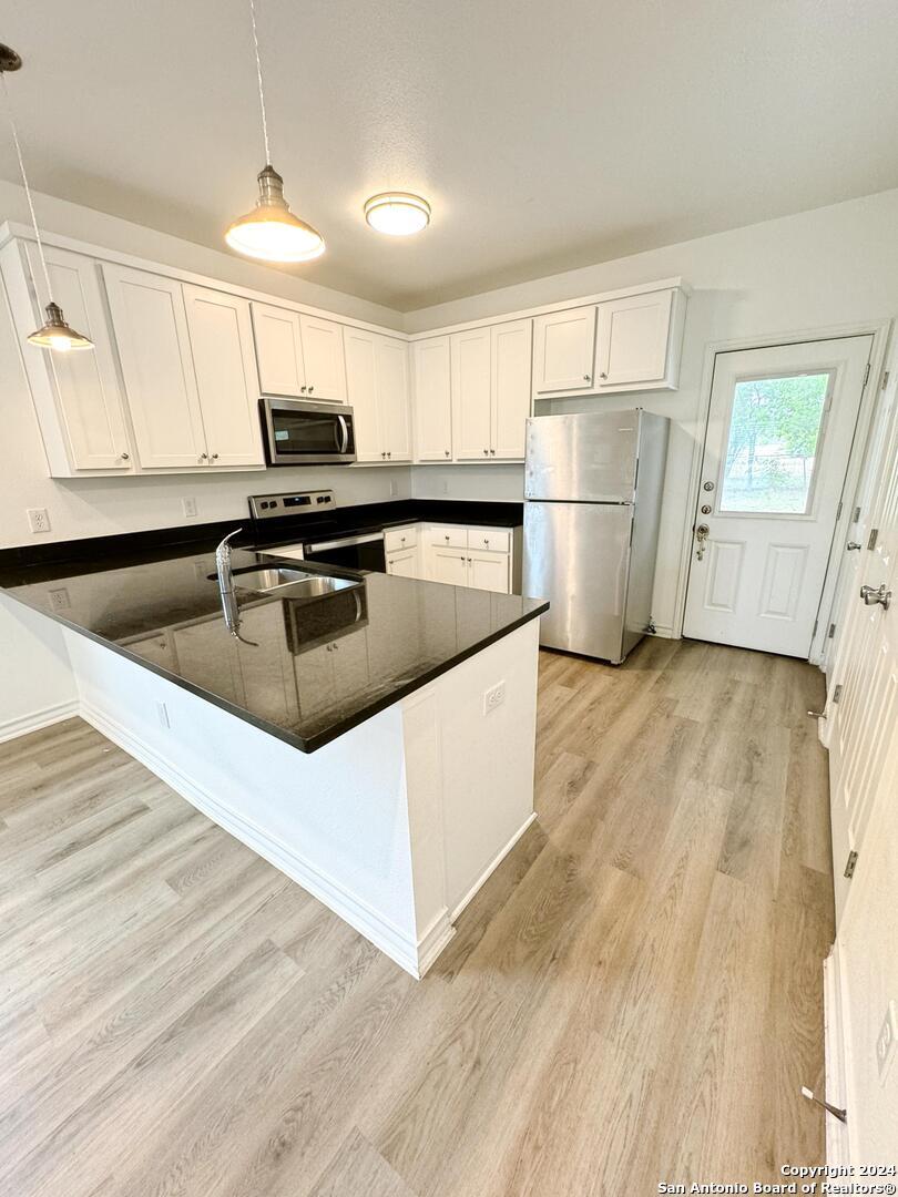Property Photo:  707 Runnels Ave 102  TX 78208 
