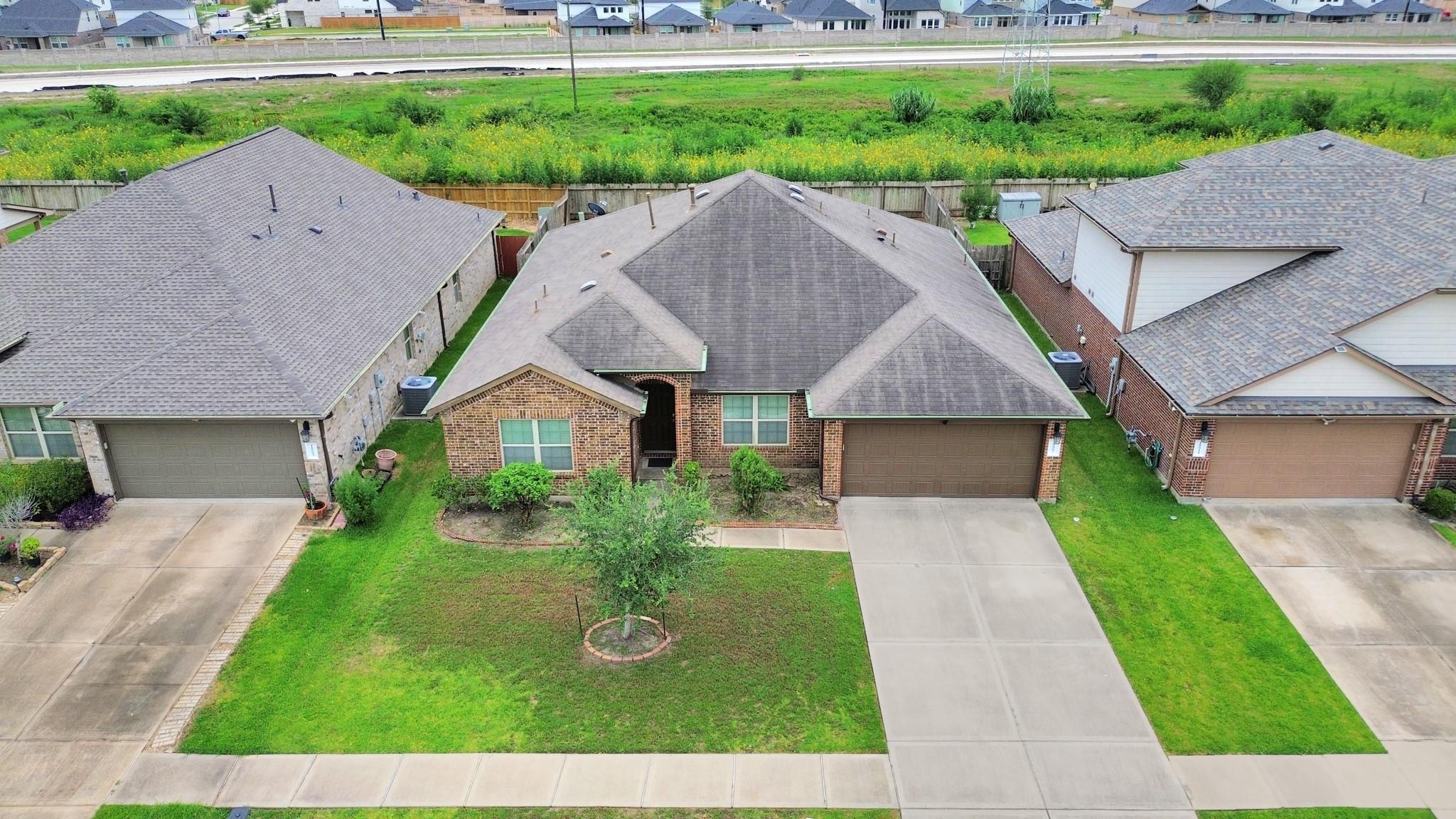 Property Photo: 18007 Tenasserim Pine Trace TX 77407