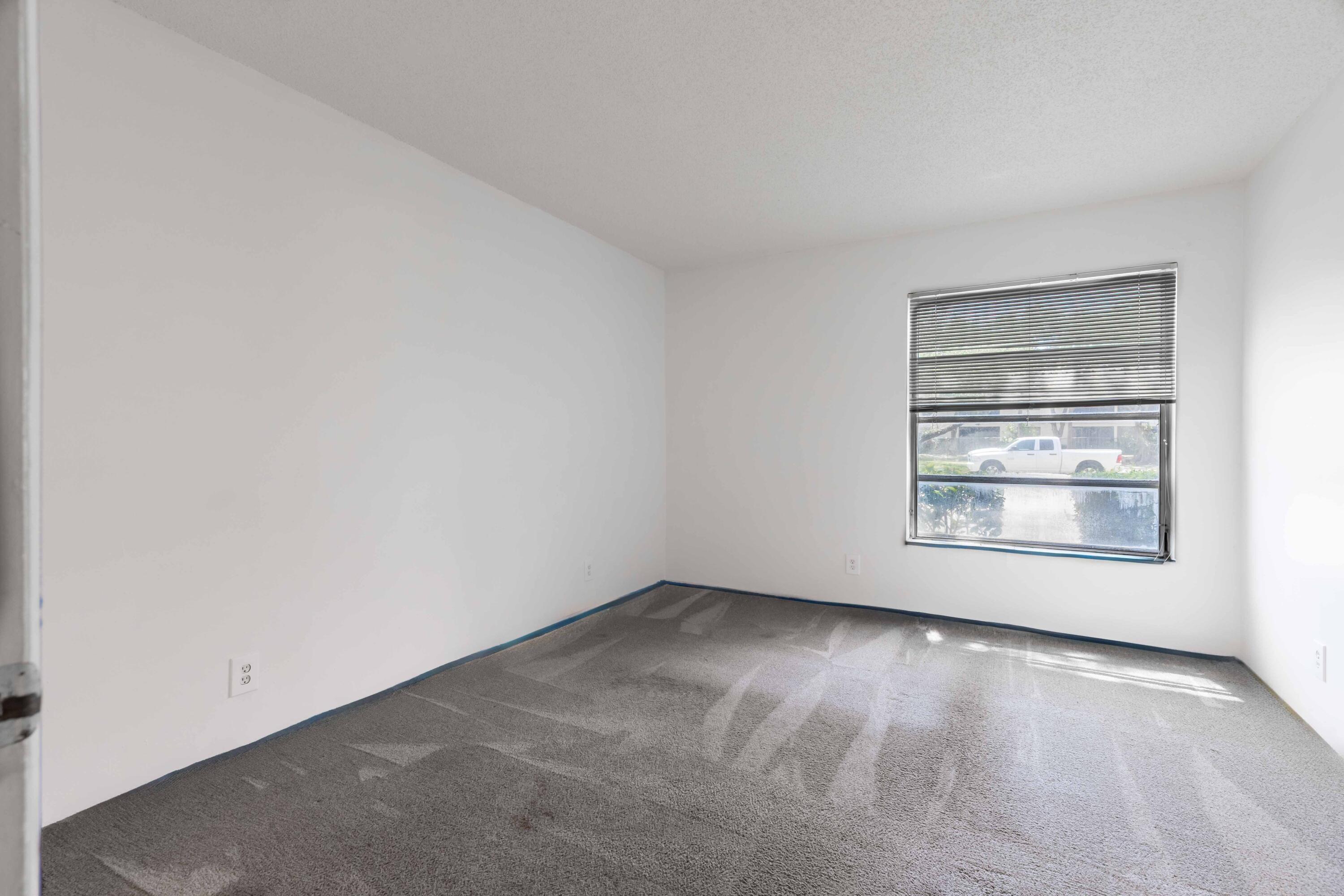 Property Photo: 490 NW 20th Street 1050 FL 33431