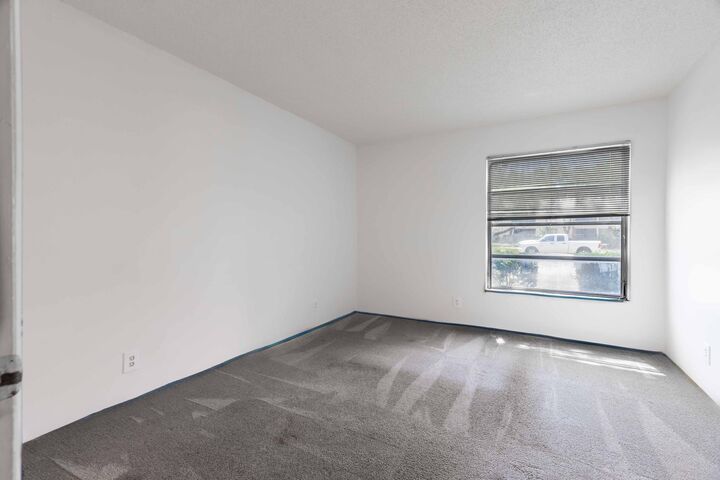 Property Photo: 490 NW 20th Street 1050 FL 33431