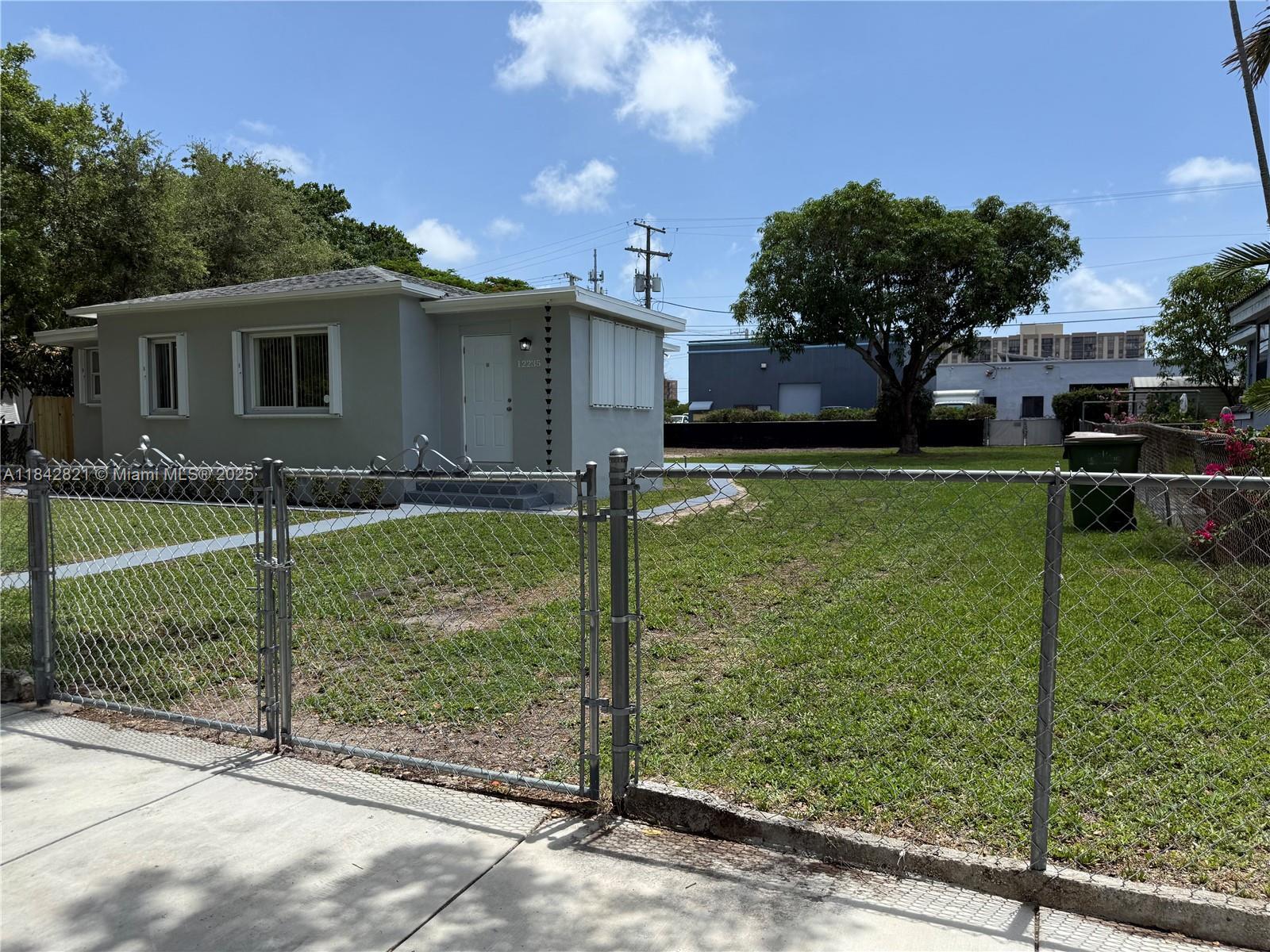 Property Photo: 12235 NE 12th Pl FL 33161