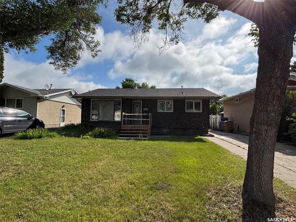 Property Photo: 211 Upland Drive SK S4R 6C6
