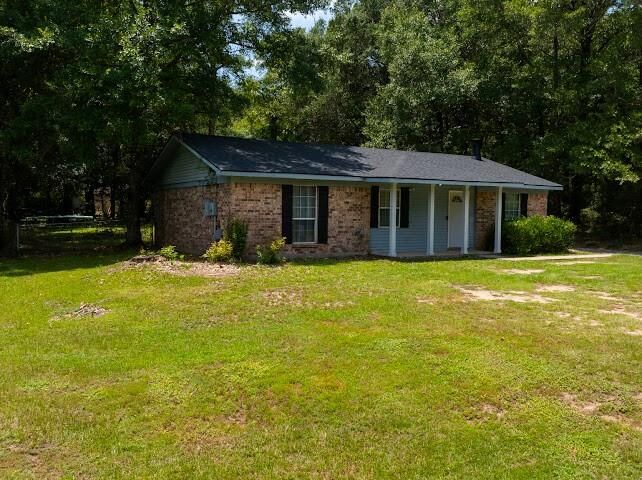 Property Photo: 7011 Jamestown Drive AL 36544