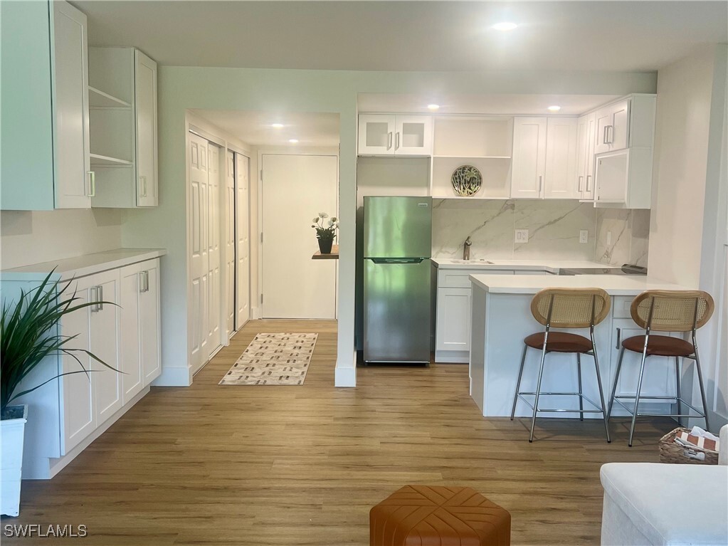 Property Photo: 5 Bluebill Avenue 105 FL 34108