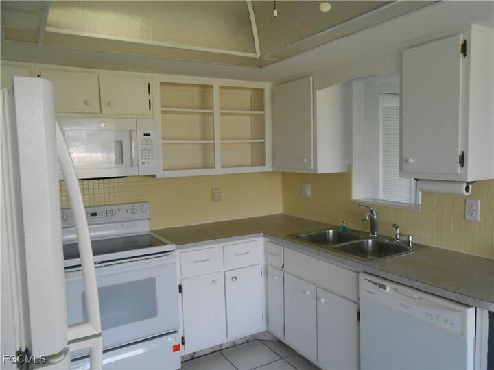 Property Photo:  343 Joel Boulevard 211  FL 33936 