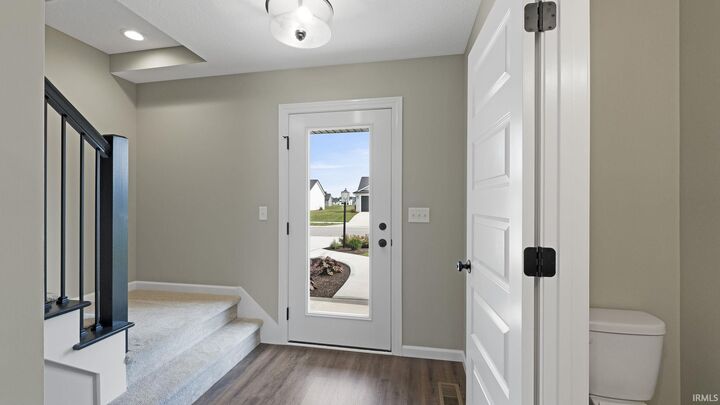 Property Photo:  1423 Herdsman Boulevard  IN 46748 