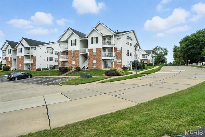 Property Photo:  1209 Woodland Point Drive K  MO 63146 