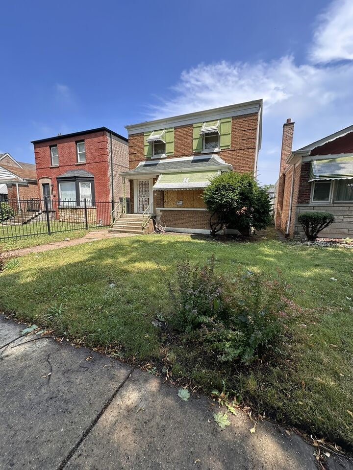 Property Photo: 9527 S Woodlawn Avenue IL 60628