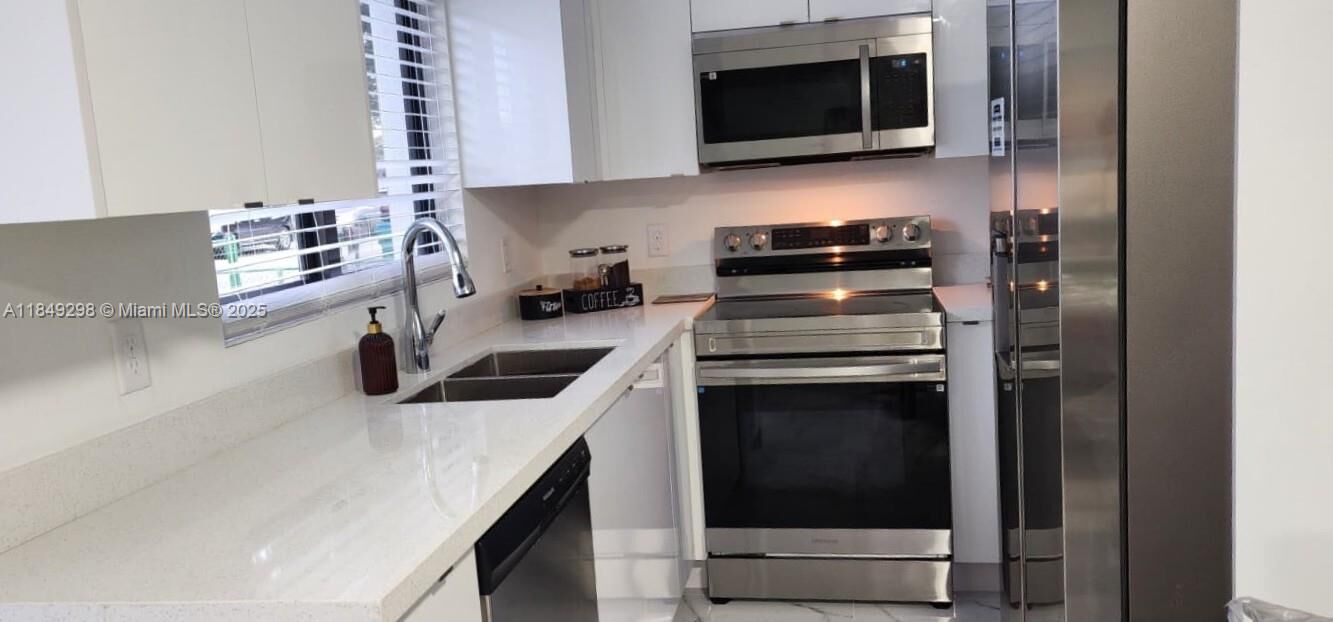 Property Photo:  8012 NW 14th Pl A  FL 33147 