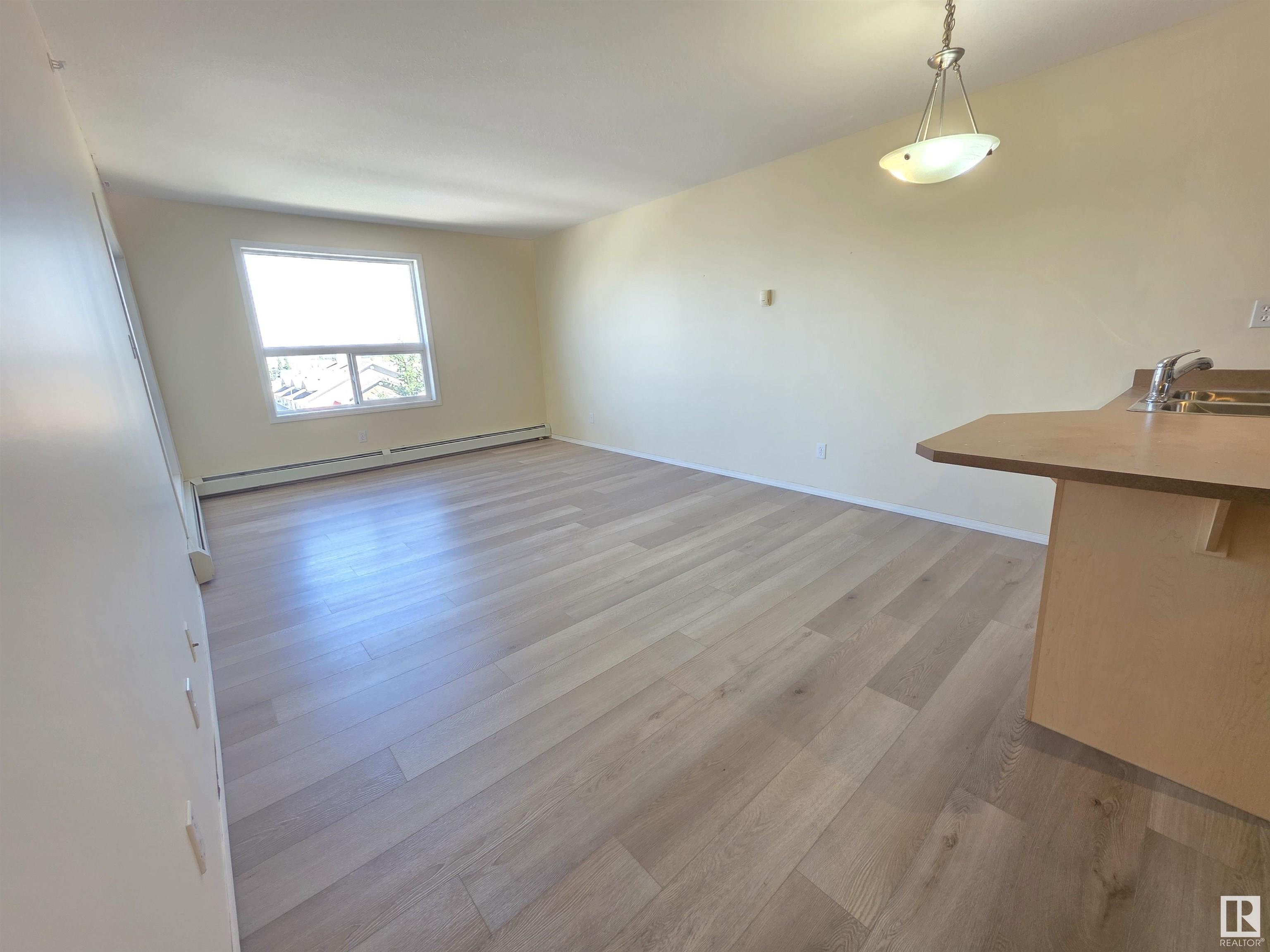 Property Photo:  4310 33 Street 403  AB T7Z 0A8 