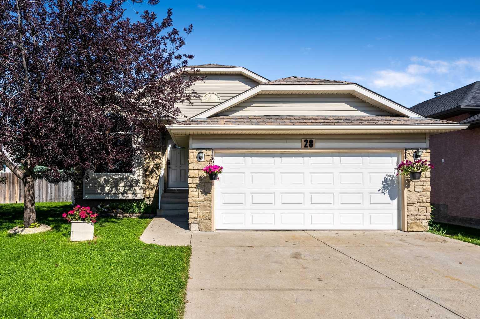 Property Photo: 28 High Ridge Crescent NW AB T1V 1X7
