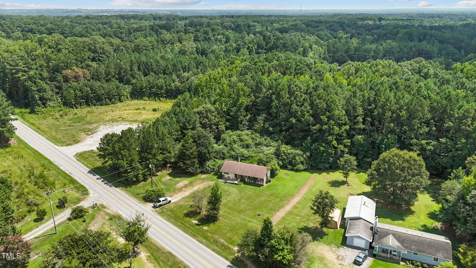 Property Photo:  7601 Humie Olive Road  NC 27502 