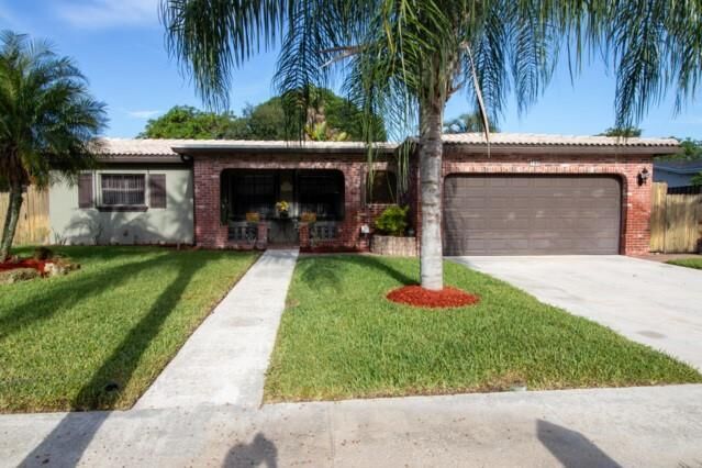Property Photo: 149 NW 77th Ave FL 33063