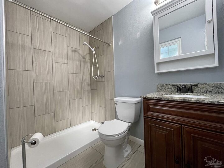 Property Photo: 7090 Moore Ave FL 32526